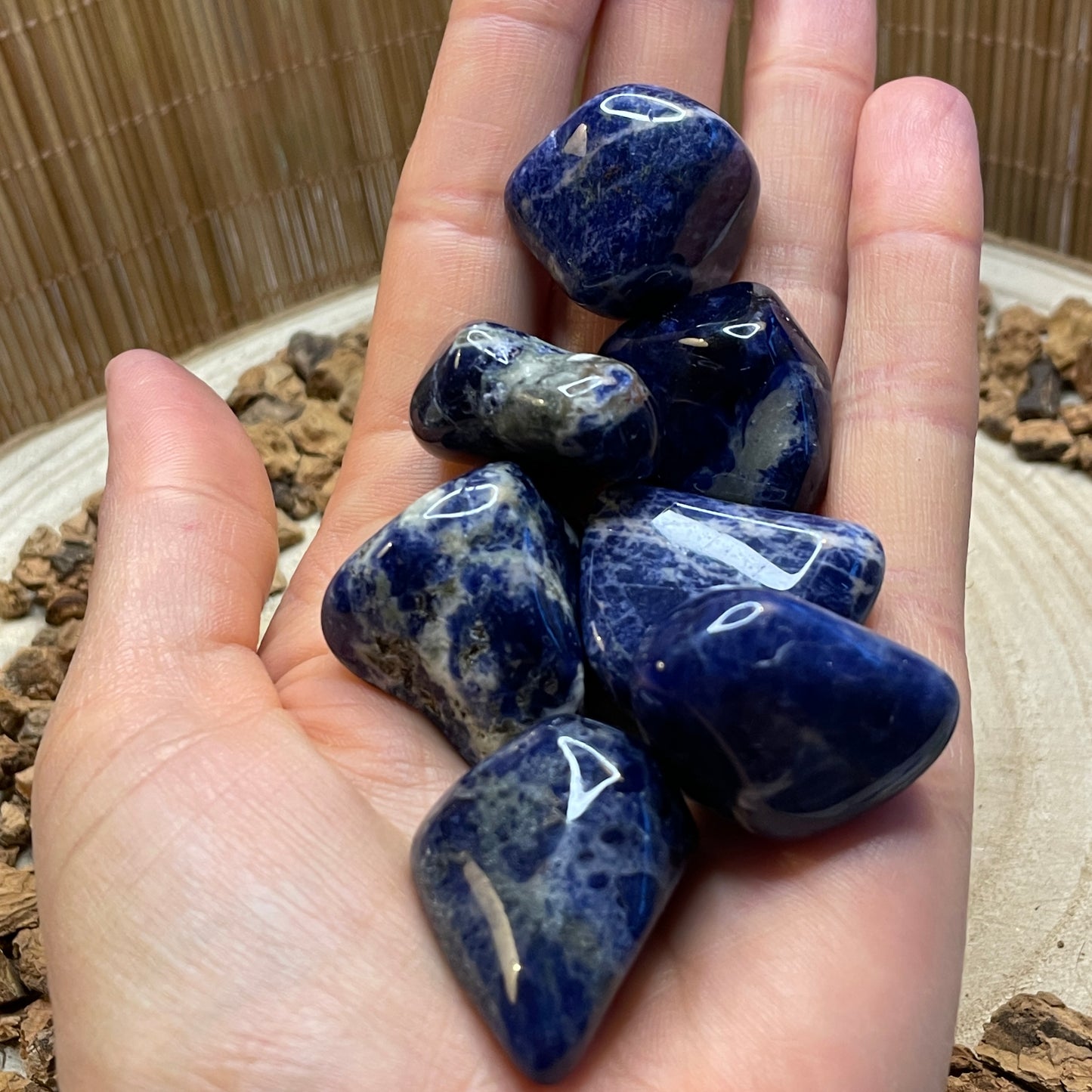 Sodaliet trommelsteen